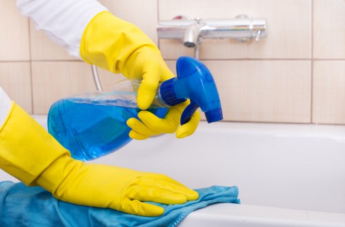 Technician wearing PPE during oven cleaning in Bloomsbury